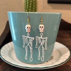 Skeleton earrings for pierced ears